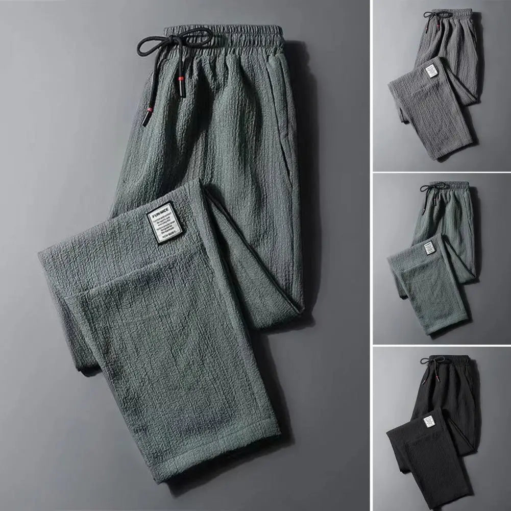 Pantalones fibra de poliéster para hombre y mujer. Pantalones sueltos de primavera y otoño, pantalones de informales , pantalones casuales, pantalones para hombre y mujer.