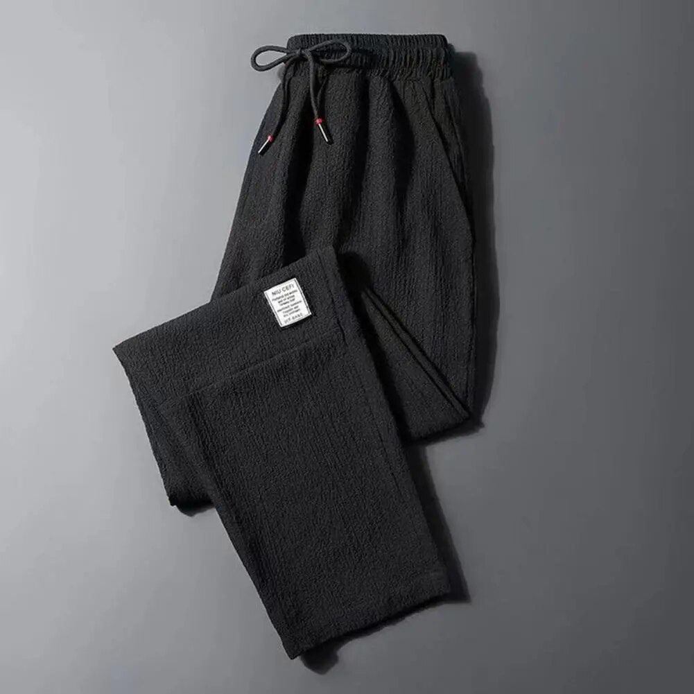 Pantalones fibra de poliéster para hombre y mujer. Pantalones sueltos de primavera y otoño, pantalones de informales , pantalones casuales, pantalones para hombre y mujer.